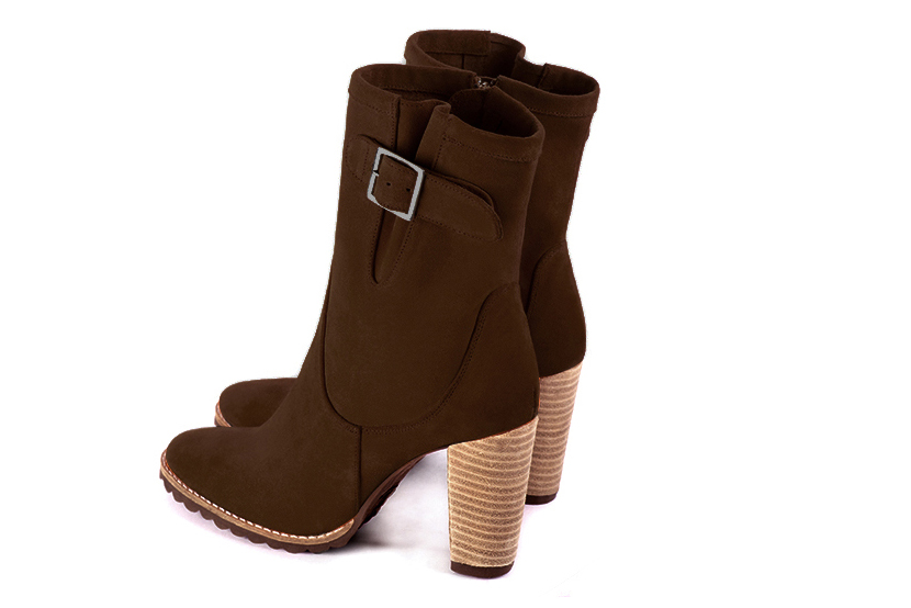 Dark brown women's ankle boots with buckles on the sides. Round toe. High block heels. Rear view - Florence KOOIJMAN